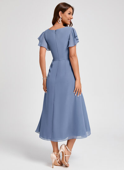 sachin and babi light blue dress 5 Wedding Guest Dresses To Wear Spring 2022 main image 1